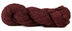 A photo of a wine colored hank of Simplinatural yarn.