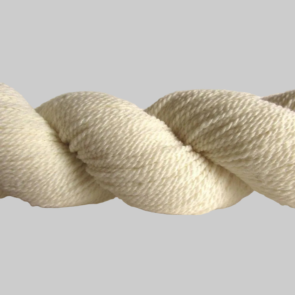 A natural colored hank of the Mountain Meadow Wool Saratoga yarn collection