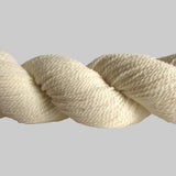 A natural colored hank of the Mountain Meadow Wool Saratoga yarn collection