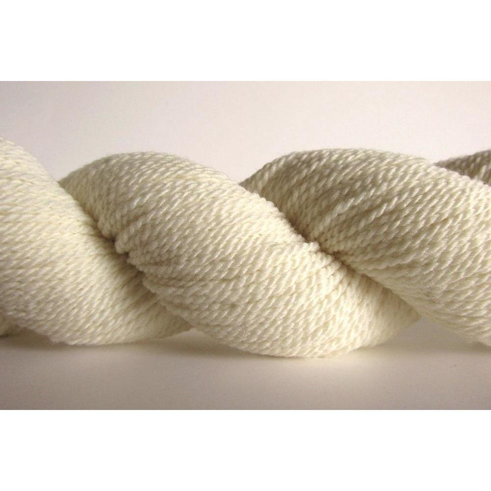 A natural colored hank of the Mountain Meadow Wool Saratoga yarn collection