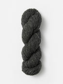 Skein of Blue Sky Fibers Woolstok yarn in the color dark heathered grey