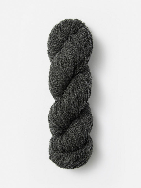 Skein of Blue Sky Fibers Woolstok yarn in the color dark heathered grey