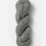 Skein of Blue Sky Fibers Woolstok yarn in the color light grey
