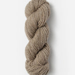 Skein of Blue Sky Fibers Woolstok yarn in the color tan
