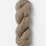 Skein of Blue Sky Fibers Woolstok yarn in the color tan