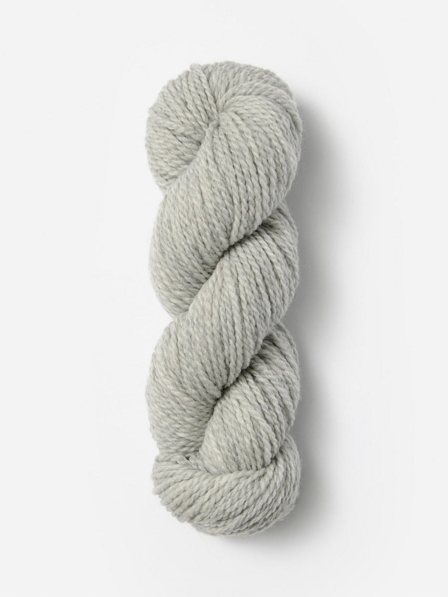 Skein of Blue Sky Fibers Woolstok wool yarn color light gray
