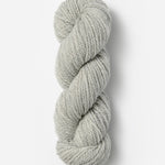 Skein of Blue Sky Fibers Woolstok wool yarn color light gray