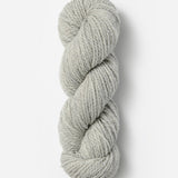 Skein of Blue Sky Fibers Woolstok wool yarn color light gray