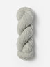 Skein of Blue Sky Fibers Woolstok wool yarn color light gray