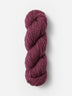 Skein of Blue Sky Fibers Woolstok yarn in the color mauve