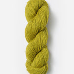Skein of Blue Sky Fibers Woolstok yarn in the color yellow