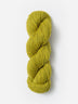 Skein of Blue Sky Fibers Woolstok yarn in the color yellow