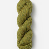 Skein of Blue Sky Fibers Woolstok yarn in the color ochre