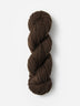 Skein of Blue Sky Fibers Woolstok yarn in the color brown