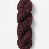 Skein of Blue Sky Fibers Woolstok yarn in the color maroon