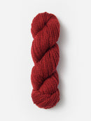 Skein of Blue Sky Fibers Woolstok yarn in the color red