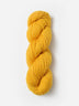 Skein of Blue Sky Fibers Woolstok yarn in the color yellow