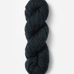 Skein of Blue Sky Fibers Woolstok yarn in the color dark navy blue