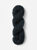 Skein of Blue Sky Fibers Woolstok yarn in the color dark navy blue