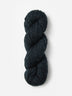 Skein of Blue Sky Fibers Woolstok yarn in the color dark navy blue