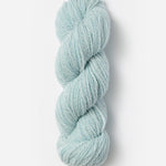 Skein of Blue Sky Fibers Woolstok yarn in the color light blue