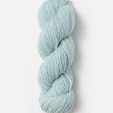 Skein of Blue Sky Fibers Woolstok yarn in the color light blue