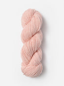 Skein of Blue Sky Fibers Woolstok yarn in the color light pink