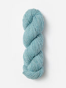 Skein of Blue Sky Fibers Woolstok yarn in the color sky blue