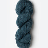 Skein of Blue Sky Fibers Woolstok yarn in the color teal