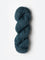Skein of Blue Sky Fibers Woolstok yarn in the color teal