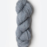 Skein of Blue Sky Fibers Woolstok yarn in the color light heathered grey