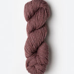 Skein of Blue Sky Fibers Woolstok yarn in the color mauve