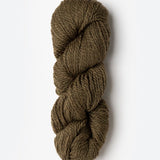 Skein of Blue Sky Fibers Woolstok yarn in the color light brown