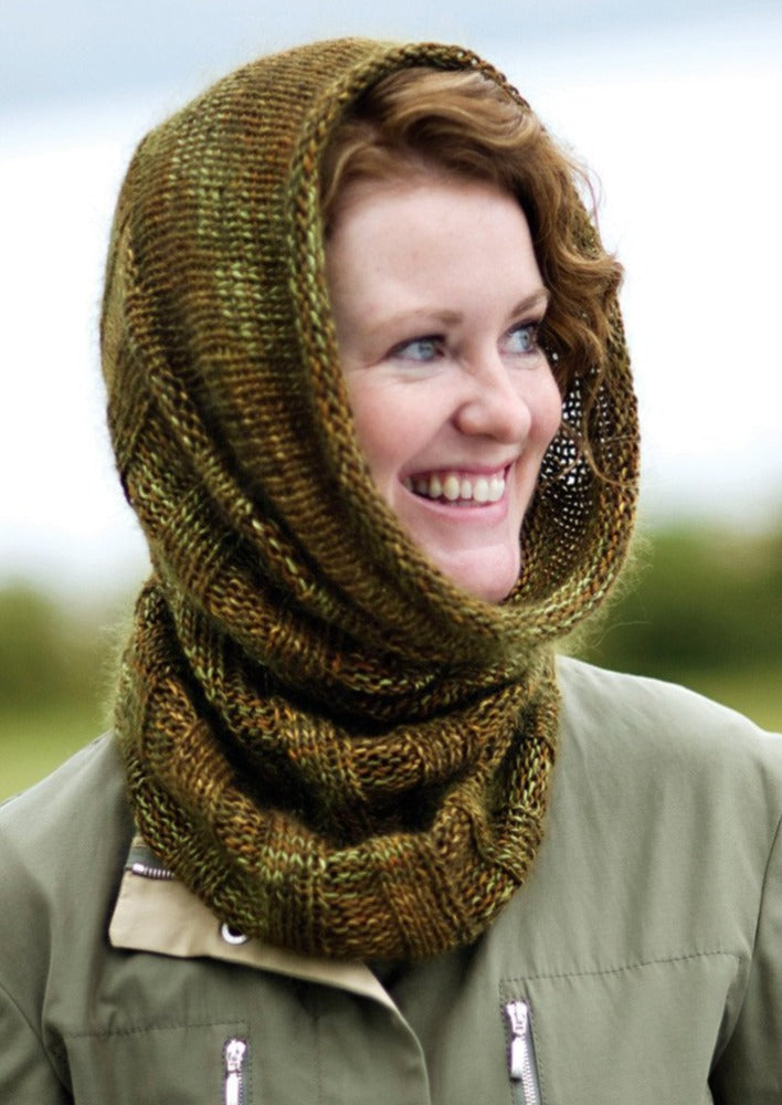 A woman wearing a knitted cowl