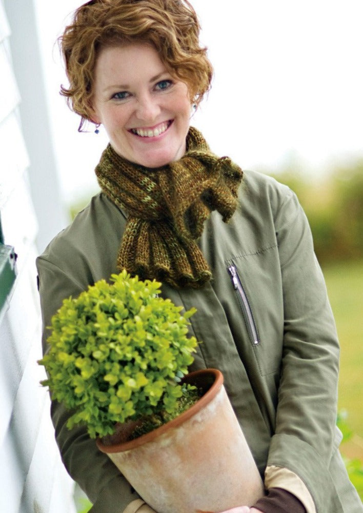 A woman wearing a knitted cowl