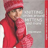 Woman with red and pink hat and mittens