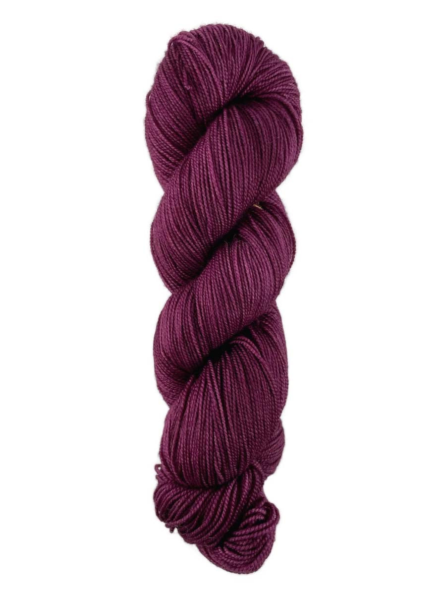 A purple skein of Western Sky Knits Aspen Sock yarn