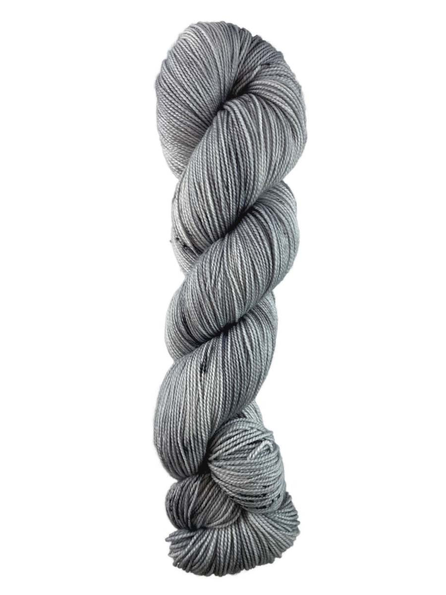 A grey skein of Western Sky Knits Aspen Sock yarn