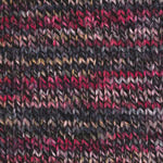 A black and red mix of Plymouth Encore Colorspun yarn