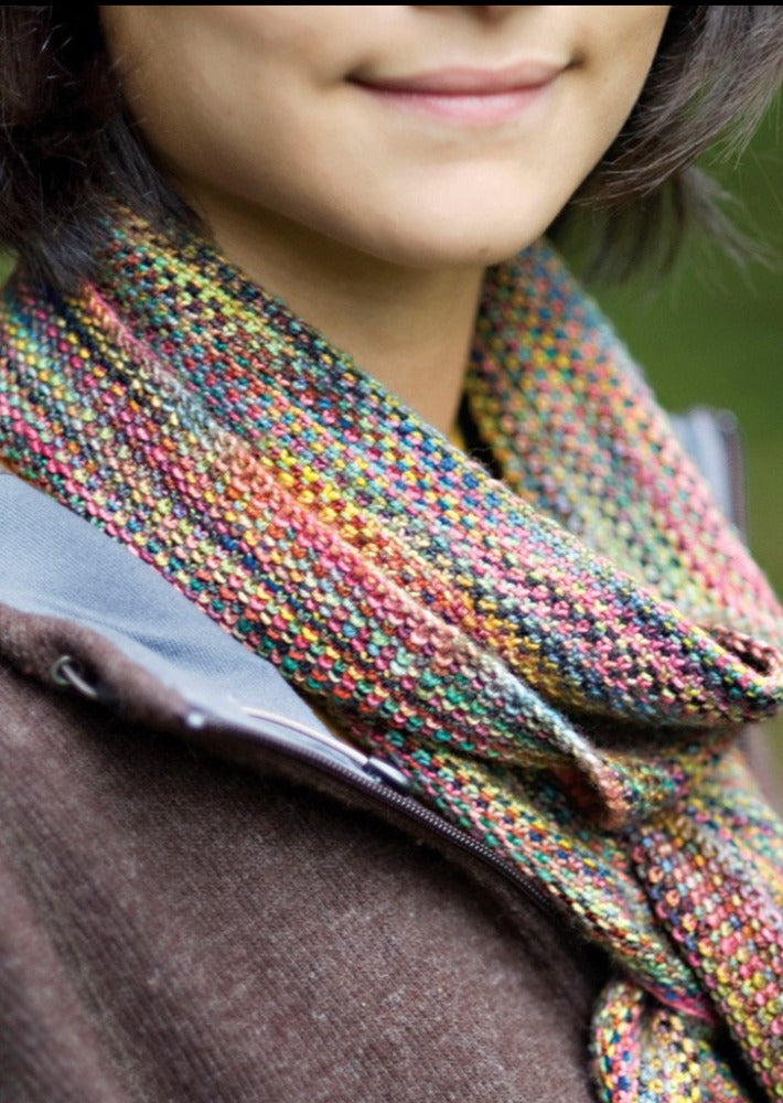 Woman wearing multi colored scarf