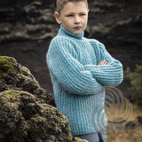 Boy in a light blue Lopi sweater