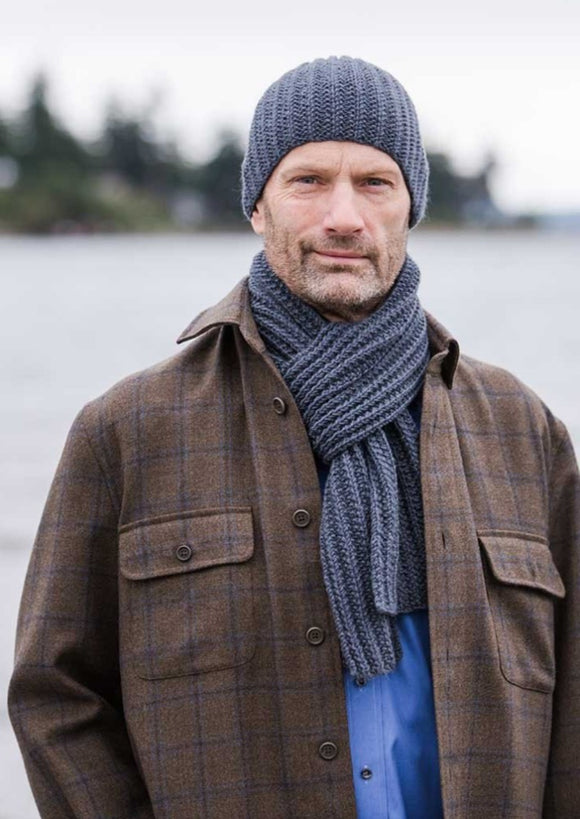 Man wearing hat and scarf