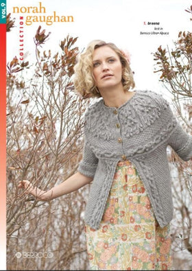 cover of norah gaughan vol 9, a woman in gray sweater peers through the brush