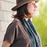 Woman wearing multi colored scarf