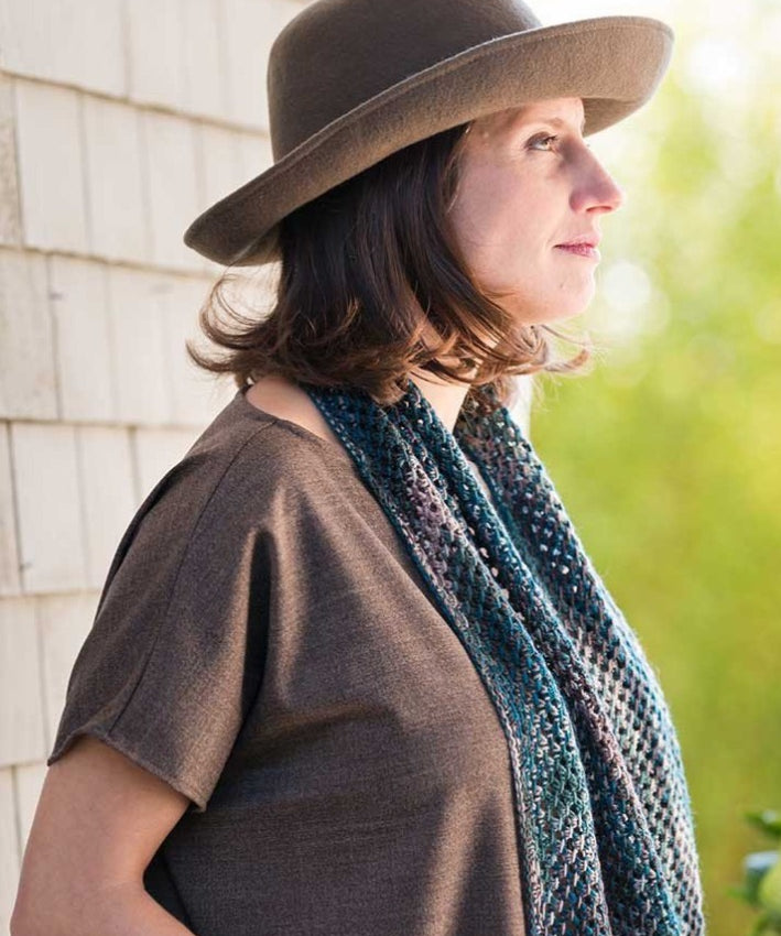 Woman wearing multi colored scarf
