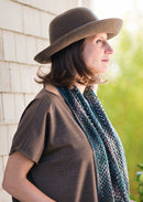 Woman wearing multi colored scarf