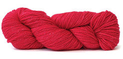 A photo of a bright pink hank of Simplinatural yarn.