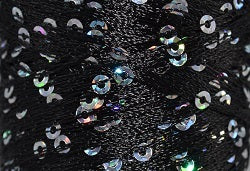 A close-up photo of SWTC String Me Along black colored sequined thread