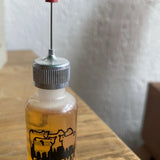 Photo of a bottle of spinning wheel oil