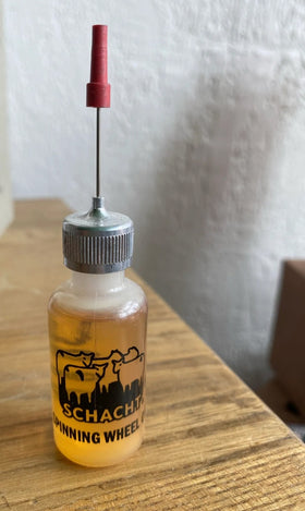 Photo of a bottle of spinning wheel oil